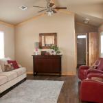 Living Room in the Classic 1202, Cabin Style at Recreational Resort Cottages and Cabins in Rockwall, Texas
