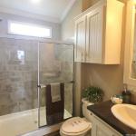 Bathroom in the Classic series 1205 on display at Recreational Resort Cottages and Cabins in Rockwall, Texas. 