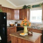 CS-1207 Kitchen with Moveable Island at Recreational Resort Cottages and Cabins in Rockwall, Texas 