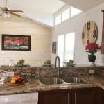 Kitchen cabinets in the Classic Model 1208 at Recreational Resort Cottages and Cabins in Rockwall, Texas 
