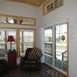 516 Interior with Sliding Glass Door to Porch. A-516 Flipped by Recreational Resort Cottages and Cabins, Rockwall, Texas. Cabinsupercenter.com, parkmodelsupercenter.com