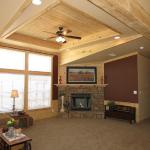 Mallard's Landing Lodge living room with floor to ceiling windows and fireplace