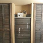 Bedroom closets and built-in dresser in the Platinum Cottages model 561SL at Recreational Resort Cottages and Cabins in Rockwall, Texas