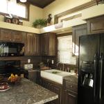 Meadowview interior with grey stained cabinets available at Recreational Resort Cottages and Cabins in Rockwall, Texas