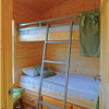 Creekside Cabin Bunks with metal rails and ladder